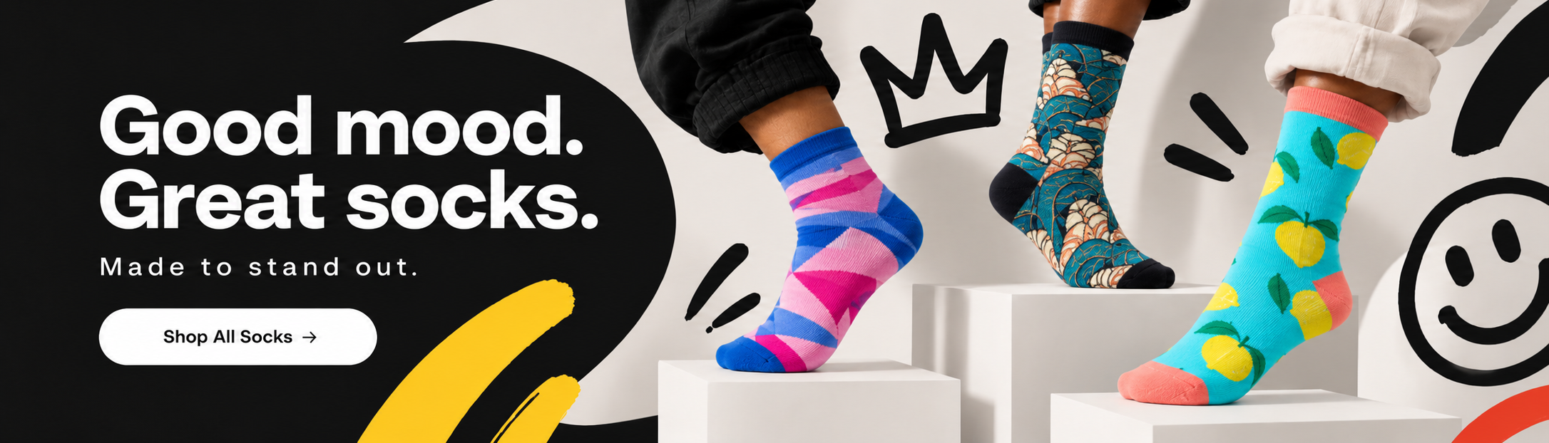 Three colorful patterned socks styled on sculptural white platforms